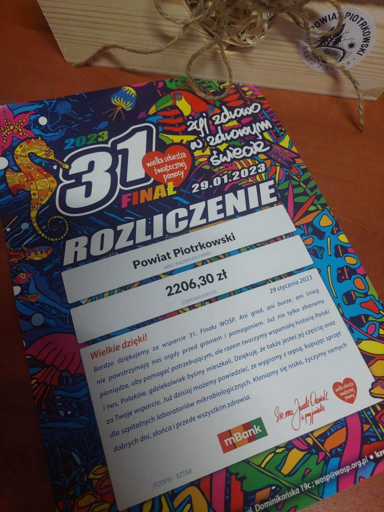 kolorowa grafika 31 Finału WOŚP z kwotą 2206,30 złotych, jaką uzbierał powiat piotrkowski.